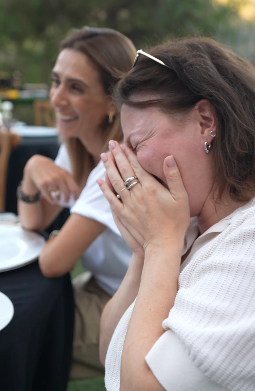 Guests laughing together at an event
